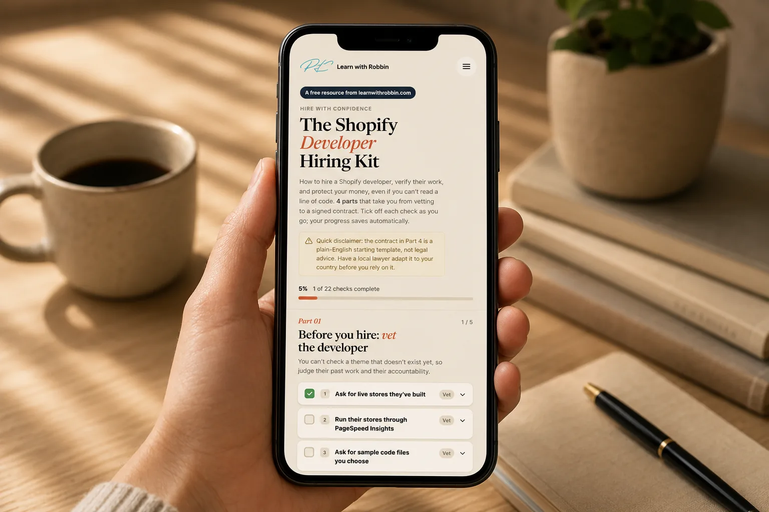 The Shopify Developer Hiring Kit on a phone